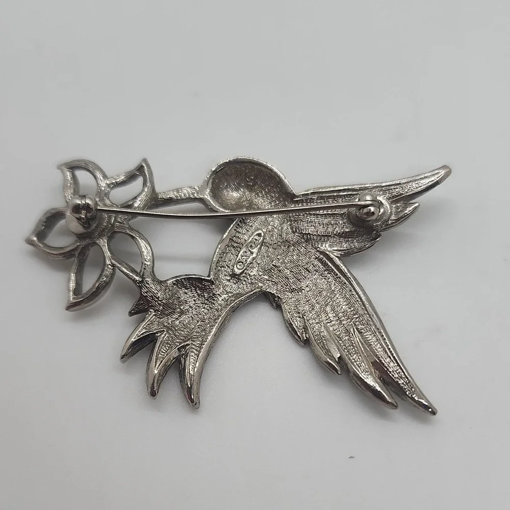 Vintage Avon‎ silver tone hummingbird bird purple eye w/ flower brooch pin